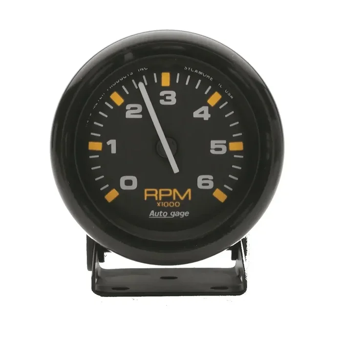 AutoMeter 2306 – Traditional incandescent lighting illuminates around the perimeter of dial